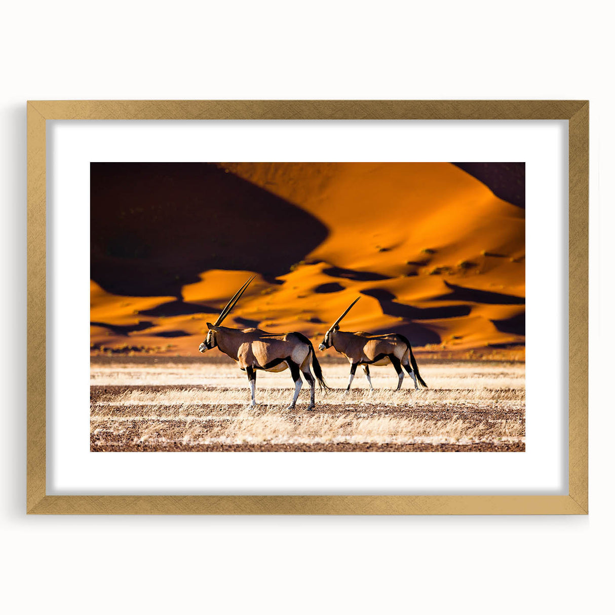Textured art print of an abstract Namibian landscape in earth tones on a framed canvas, suitable for bedroom decor.
