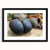 Extra large abstract art print of Seychelles scenery in vibrant colors on a textured canvas, framed in black.