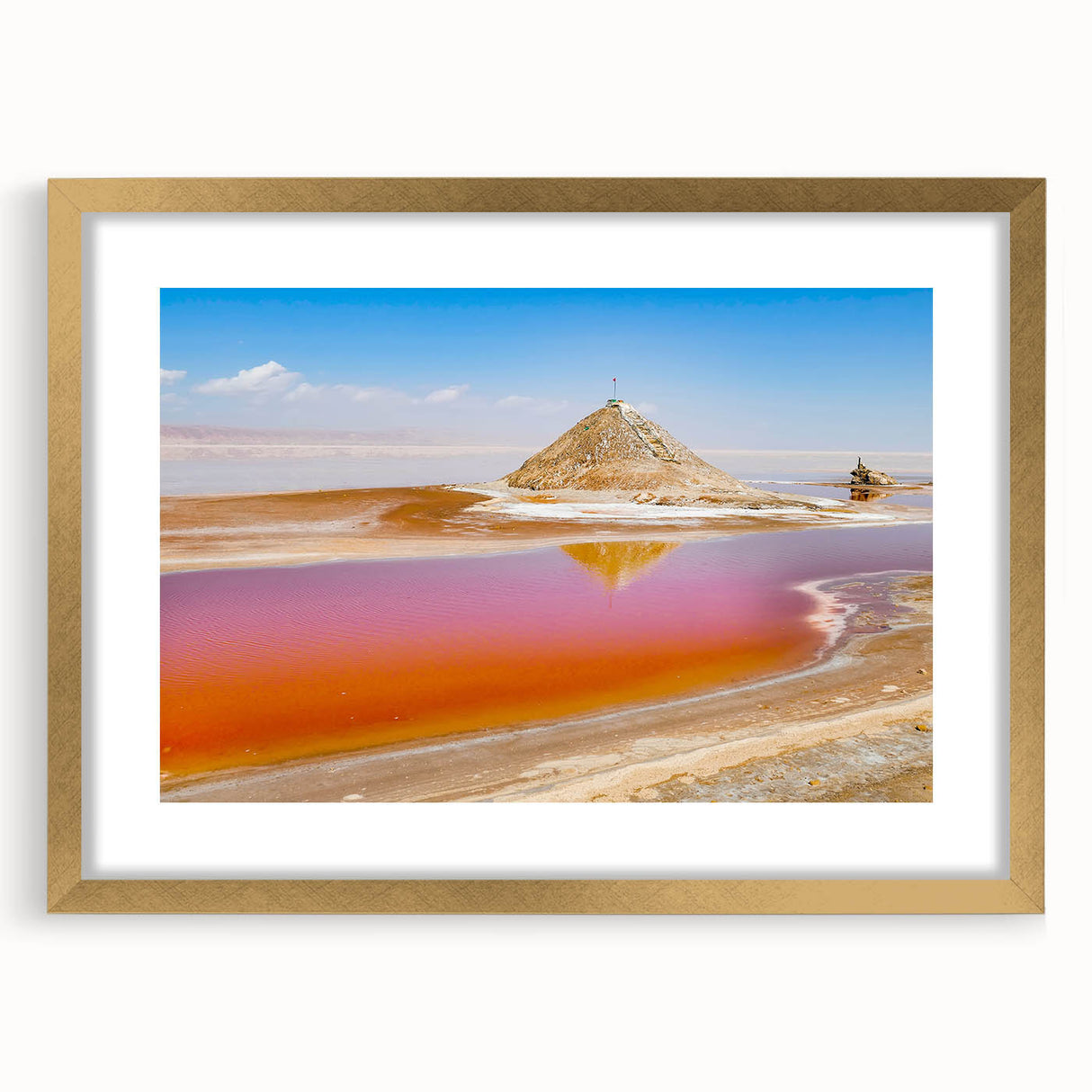 Extra large abstract art print featuring textured scenery of Tunisia in muted earth tones, framed in gold.