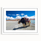 Abstract art print depicting a Tibetan landscape in muted earth tones on a framed white mat.