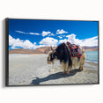 Black and white wall art featuring a vintage poster-style landscape of Tibet on a framed canvas, ideal for bedroom decor.