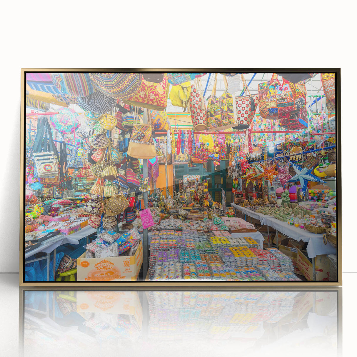 Large art print of a mid-century modernist Indian scenery in gold tones on framed acrylic.