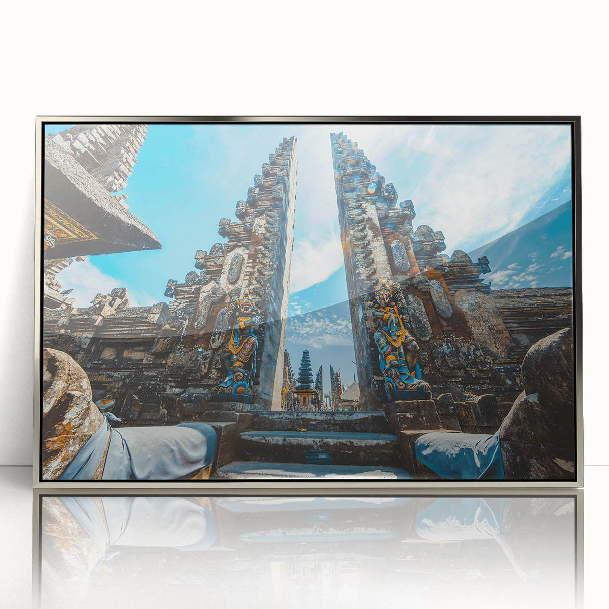 Mid-century modernist art of an Indonesian landscape in muted greens and blues on a silver-framed acrylic print.