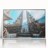 Acrylic print of a serene Indonesian landscape in muted green and blue shades, framed in white.