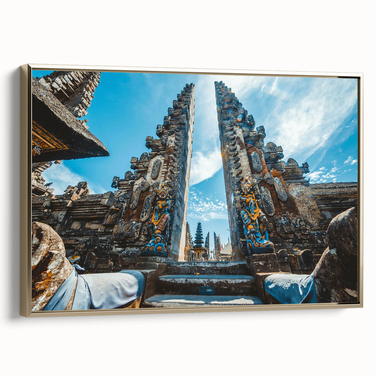 Framed canvas wall art featuring a vintage-style Indonesian landscape in muted gold and black tones, ideal for bedroom decor.