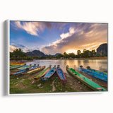 Vintage poster art of a Laos scenery in vibrant colors on a white framed canvas, ideal for living room decor.