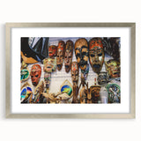 Textured art depicting an abstract ocean scene in muted blue and green, framed in silver, ideal for bedroom wall decor.