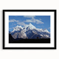 Abstract art print of colorful, textured scenery in Nepal on a large canvas with a black frame.