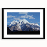 Abstract art print of colorful, textured scenery in Nepal on a large canvas with a black frame.