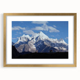 Extra large abstract art print of a textured Nepalese landscape in muted earth tones, framed in gold.