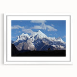 Abstract art print of a serene Nepalese landscape in muted earth tones on a framed white mat, ideal for dining room decor.