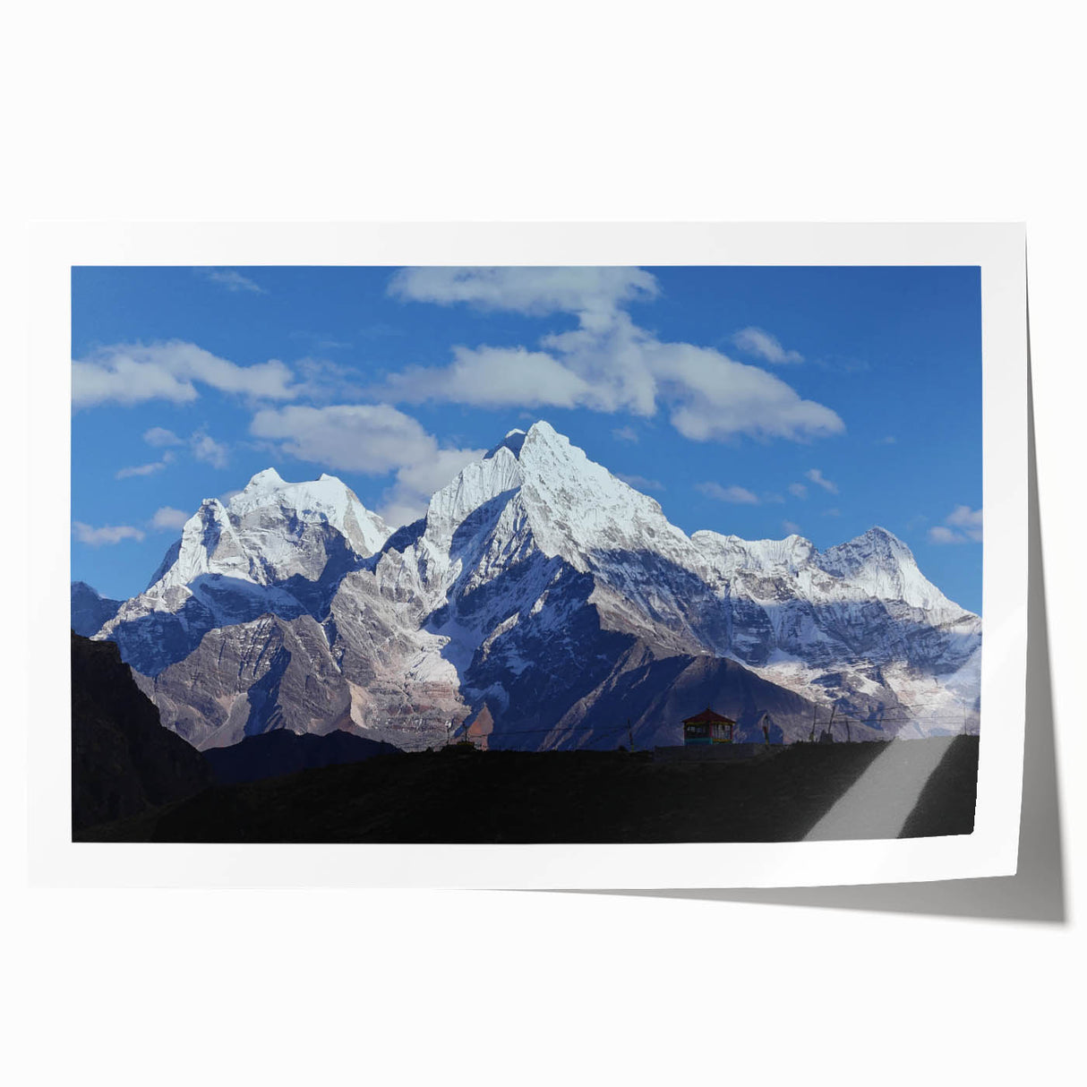 Rolled print of a serene Nepalese landscape with lush greenery and mountains, ideal for art wall dining room decor.