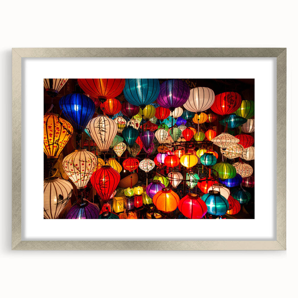 Textured art print featuring an abstract scene with earthy tones on a framed silver mat, ideal for bedroom wall decor.