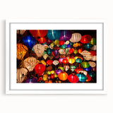 Abstract art print of a Vietnamese landscape in muted green and blue tones, framed with a white mat.