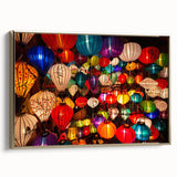 Framed canvas featuring a vintage-style landscape painting of Vietnamese scenery in muted gold and black tones.