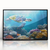 Large abstract wall art depicting the Great Barrier Reef in vibrant blue and green tones on a framed acrylic.