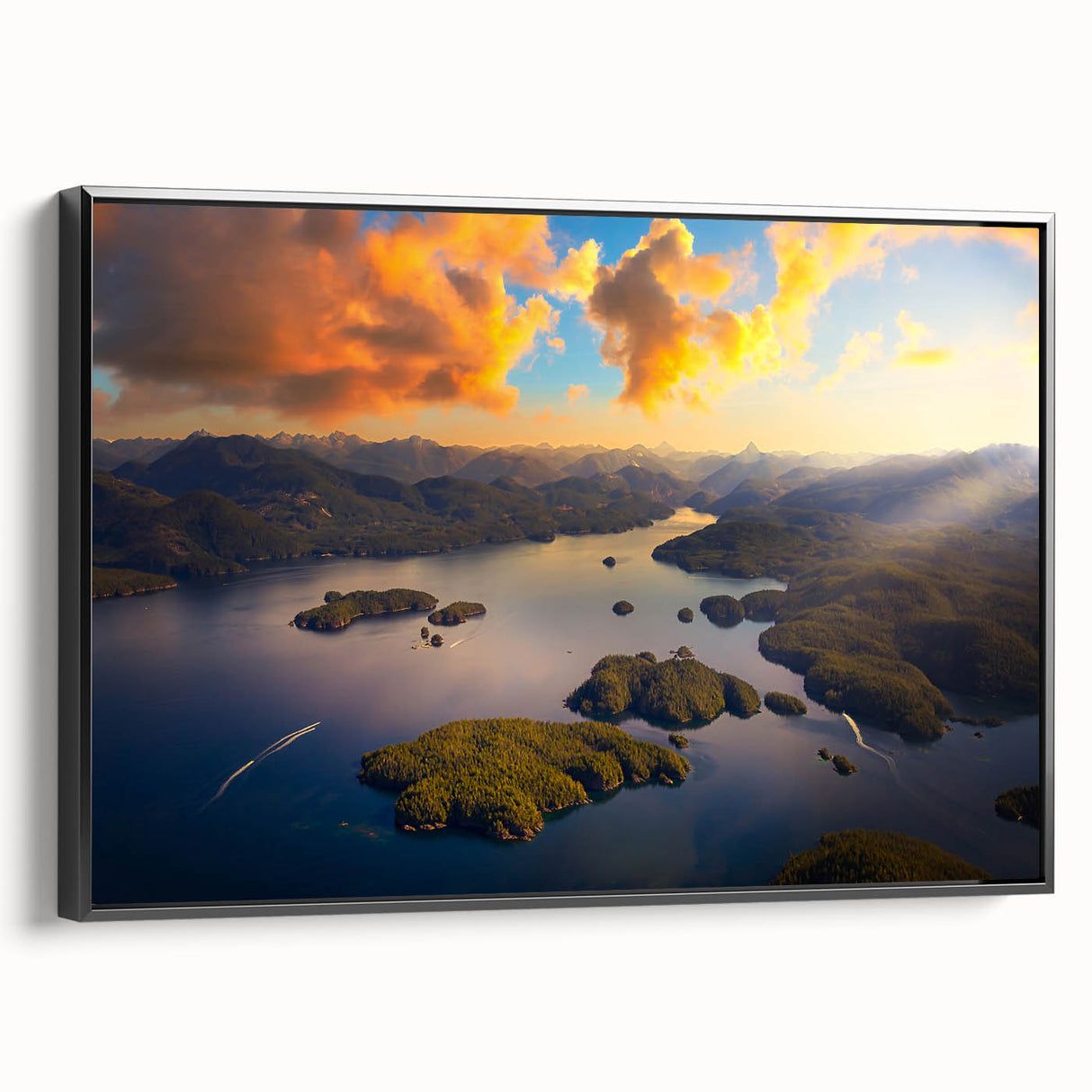 Black and white wall art featuring a vintage-style landscape painting of British Columbia on a framed canvas.
