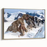 Framed canvas wall art of a Yukon landscape in black and gold, ideal for bedroom decor.