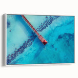 Vintage poster art of a Caribbean scene on a framed canvas, featuring vibrant colors, ideal for living room decor.