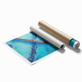 Extra large rolled print featuring lush, tropical floral scenery in vibrant green and blue tones.