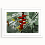 Textured abstract art print depicting a Caribbean scenery in vibrant blue and green, framed with a white mat.