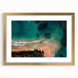 Abstract art print of a Caribbean scenery in muted blue and green tones, framed in gold, suitable for dining room decor.