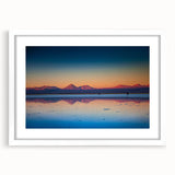 Abstract art print featuring a colorful Central American scenery on a white framed mat, ideal for dining room decor.