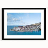 Extra large abstract art print of a colorful, textured European scenery on a black framed canvas.