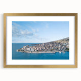 Abstract art print of a European Albanian scenery in muted earth tones on a framed gold mat, ideal for dining room decor.