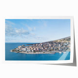 Extra large rolled print of a serene Albanian landscape with vibrant green fields and a clear blue sky.
