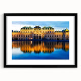 Extra large abstract art print of a colorful, textured European scenery on a black framed canvas.