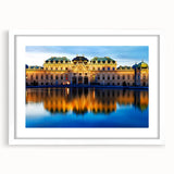 Textured abstract art print of a European scenery in muted earth tones on a white framed mat, suitable for bedroom decor.