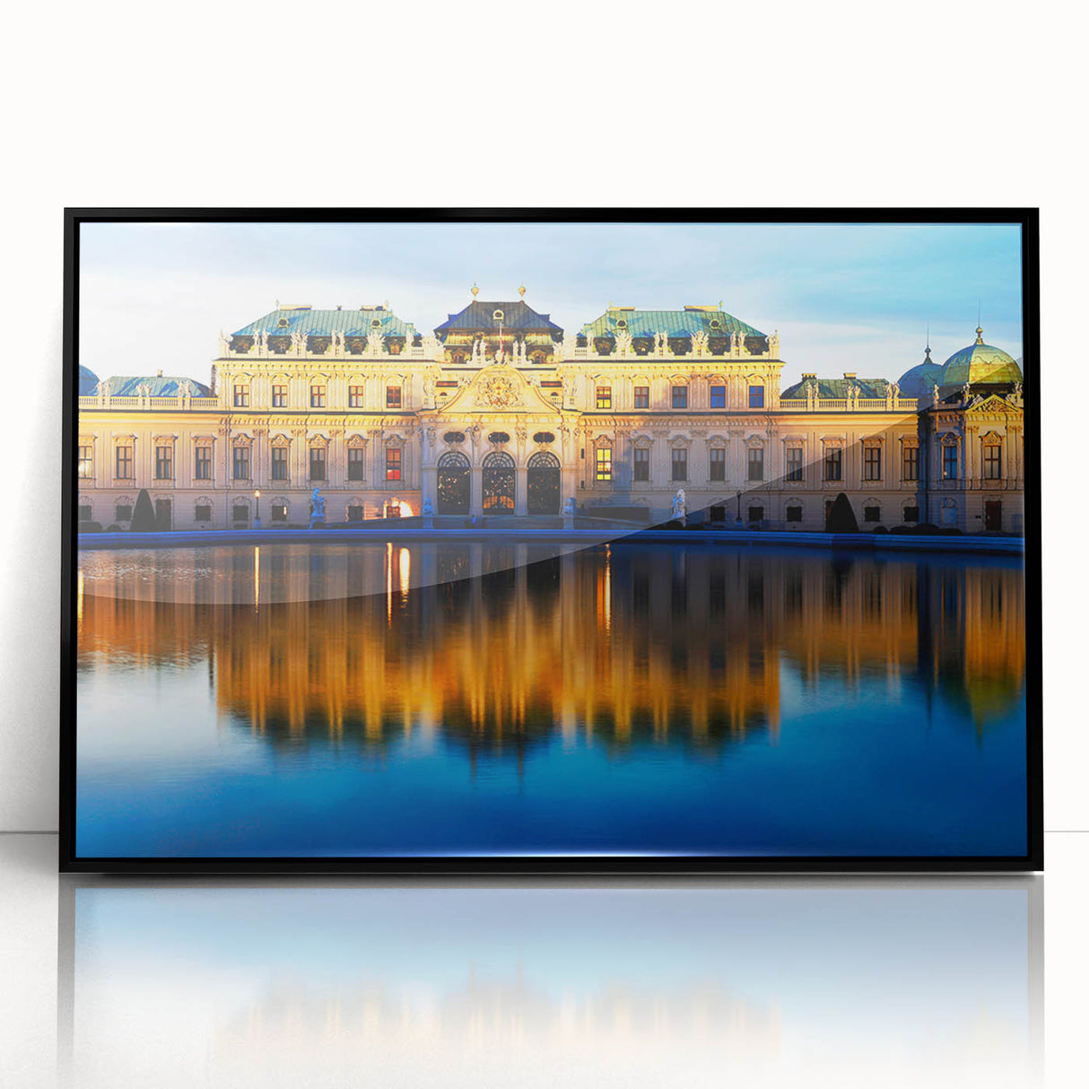 Large abstract wall art depicting a serene Austrian landscape in muted green and blue tones, framed in black acrylic.