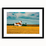 Abstract art print featuring colorful, textured imagery of a European scenery in a black frame, ideal for living room decor.