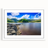 Textured abstract art print of a Cumbrian landscape in muted earth tones, framed with a white mat, ideal for bedroom art.