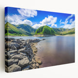 Large art depicting a serene Cumbria landscape on stretched canvas, with soft green and blue tones.