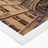 Art deco poster of Oxford scenery in muted earth tones on rolled canvas, suitable for dining room decor.