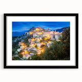 Abstract art print of a vibrant, colorful Corsican landscape on a large, textured canvas, framed in black.