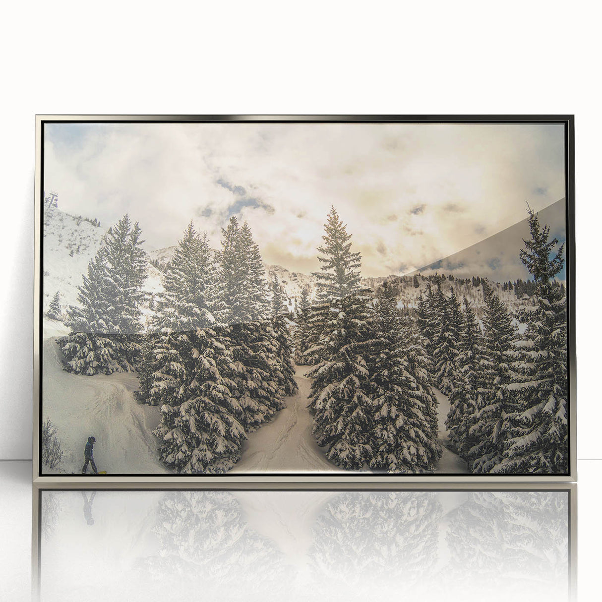 Large acrylic print of the French Alps in muted earth tones, framed in silver, suitable for modern art wall decor.
