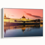 Vintage poster art of Lyon, France in vibrant colors on a large framed canvas, suitable for living room decor.