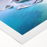 Art deco poster of a serene Greek landscape on rolled canvas, featuring soft blue and white tones.