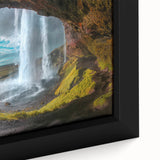 Black wall art featuring a textured Icelandic scenery in vibrant colors on a framed canvas, suitable for living room decor.