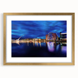 Abstract art print of a European Irish landscape in muted green and blue tones on a framed gold mat.