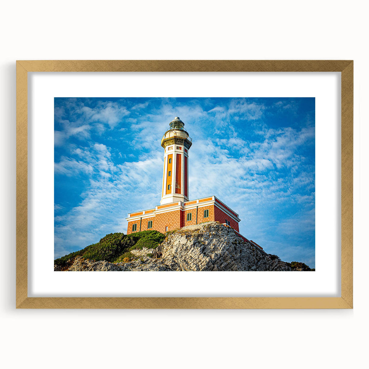 Abstract art print of Capri, Italy, featuring muted blue and white tones on a gold-framed canvas.