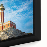 Black wall art featuring a textured, colorful depiction of Capri, Italy on a large framed canvas.