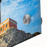 Large abstract wall art depicting the Capri coastline in muted blue and green tones on acrylic glass.