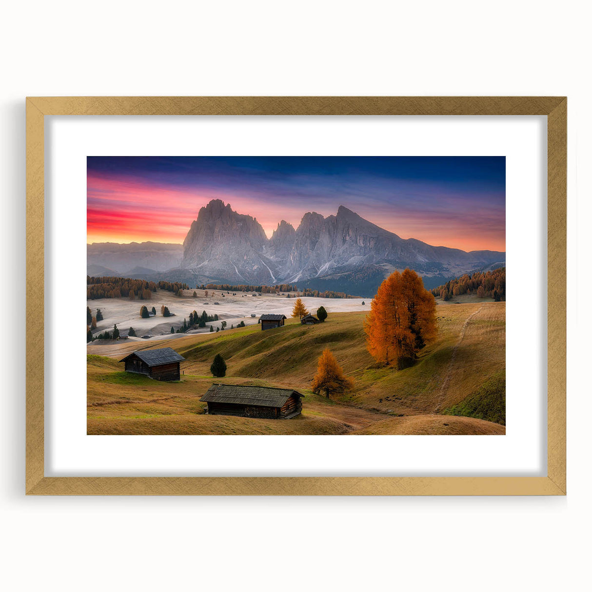 Abstract art print of the Dolomites in Italy, featuring muted earth tones on a framed gold mat, ideal for dining room decor.