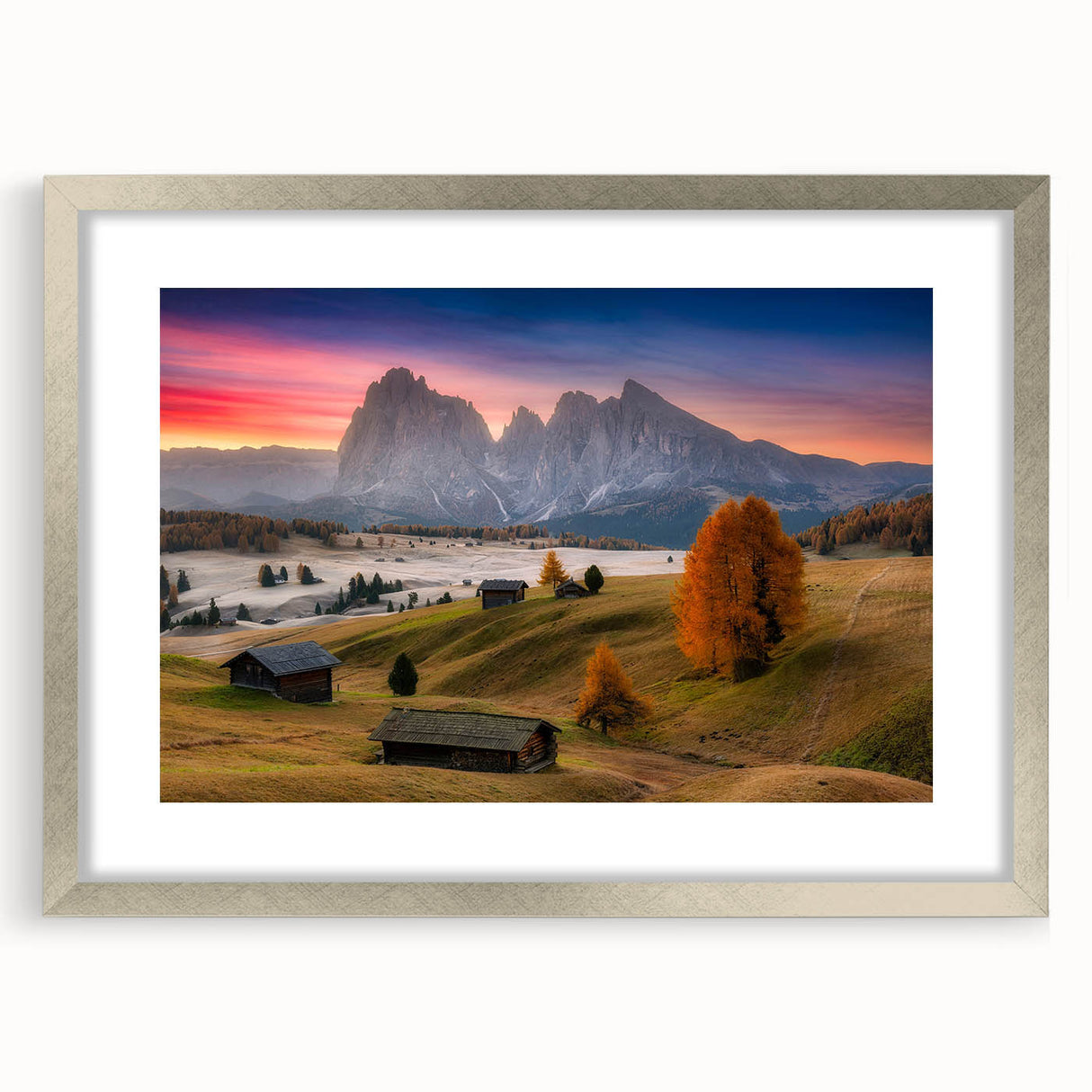 Extra large textured abstract art print of the Dolomites in Italy, with muted earth tones in a silver frame.