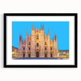 Extra large, abstract art print of a colorful Milan scenery on textured canvas, framed in black, ideal for living room decor.