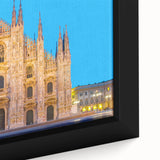 Extra large black wall art featuring a textured, colorful depiction of Milan scenery on a framed canvas.